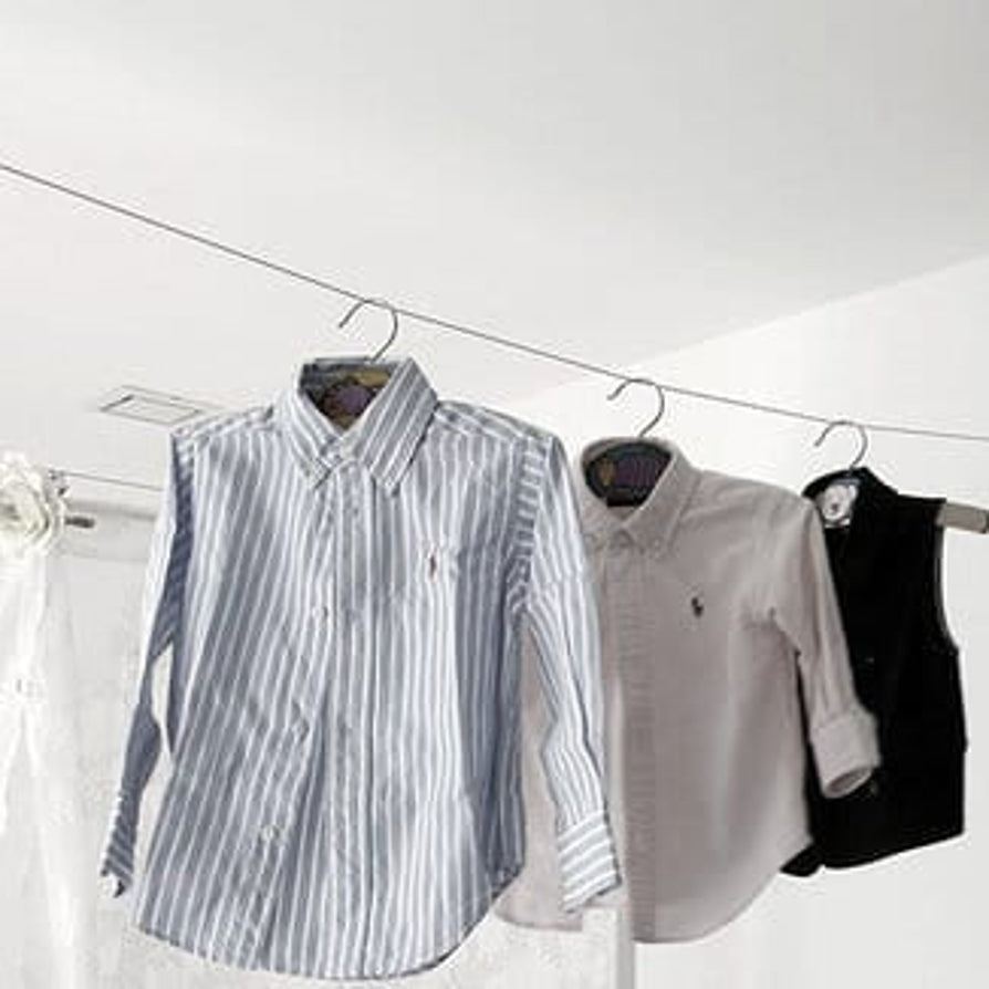Shirts drying on retractable clothesline