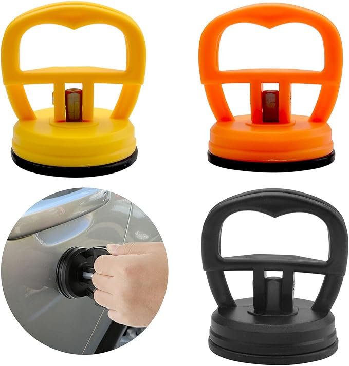 Four suction cups in yellow, orange, and black with a close-up of a hand using one of them on a car window.