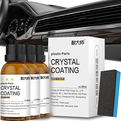 Crystal Coating Polish bottles, retail box, and applicator sponge displayed with a car dashboard interior in the background.