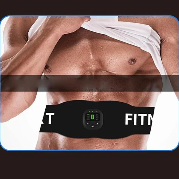 Close-up of a man's abdomen wearing a black fitness belt with digital display and 'Fitness' branding